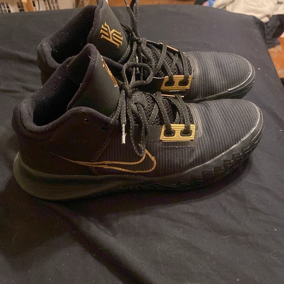 NIKE Kyrie Flytrap 4 Black and Gold metallic athletic shoes. - Picture 3 of 6